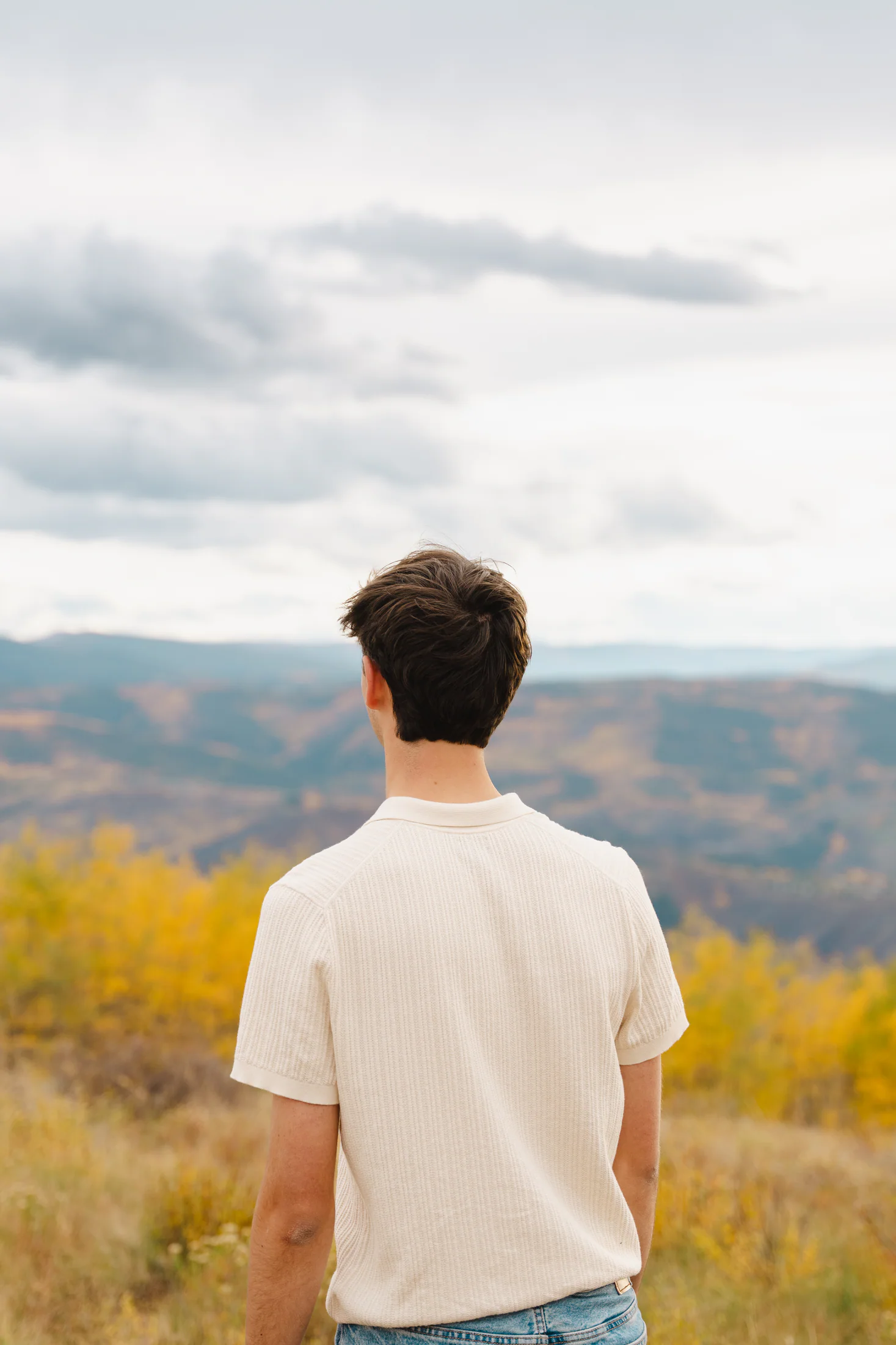 Judah from behind, looking out over the autumn valley he calls home