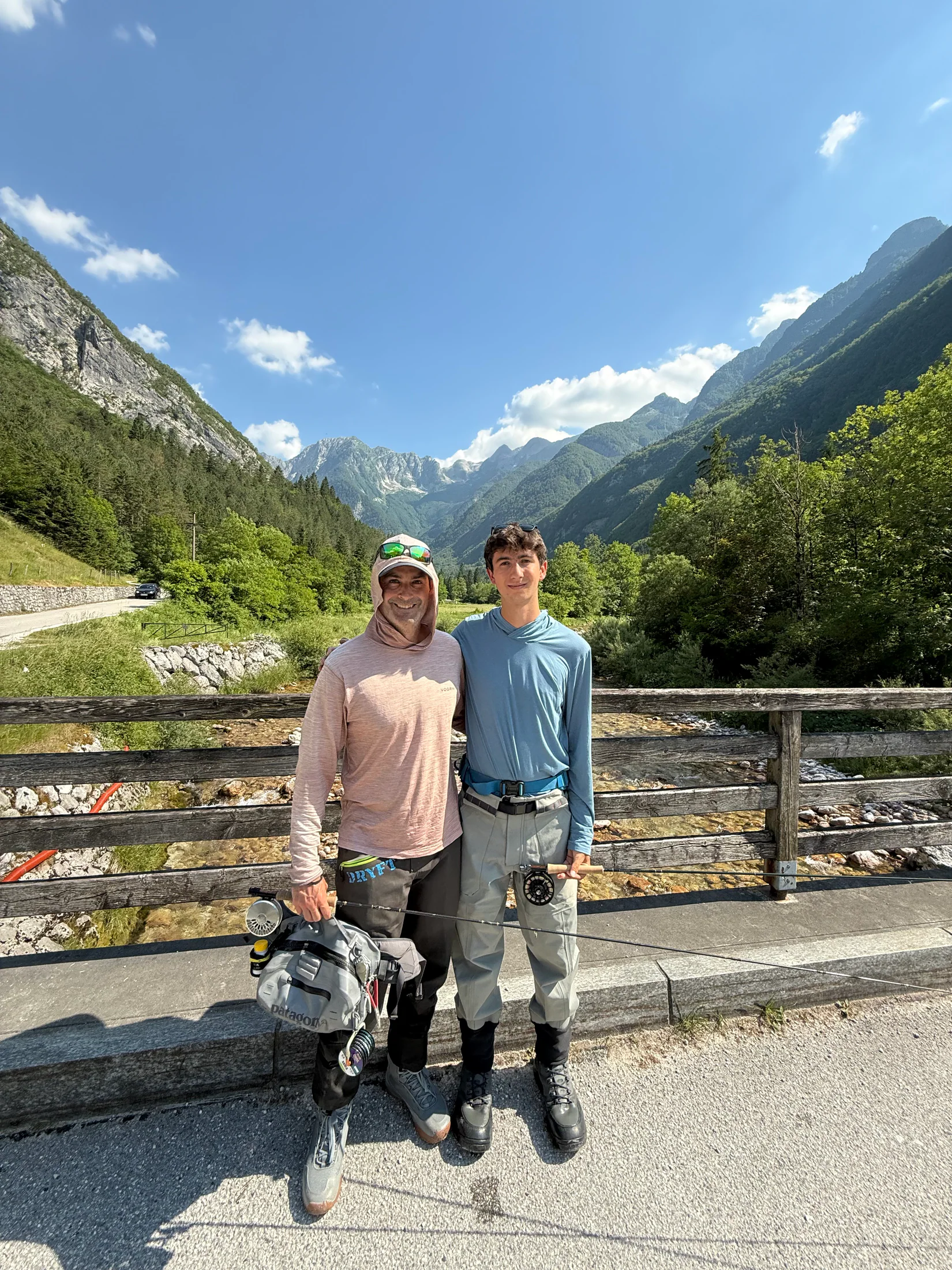 Judah and a fishing partner in waders on a Soča Valley road